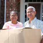Older American couple moving
