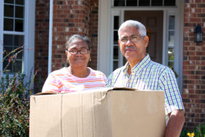 Older American couple moving