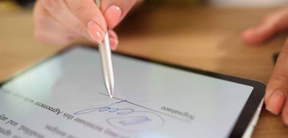 Woman signing eSignature