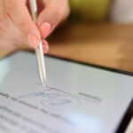 Woman signing eSignature