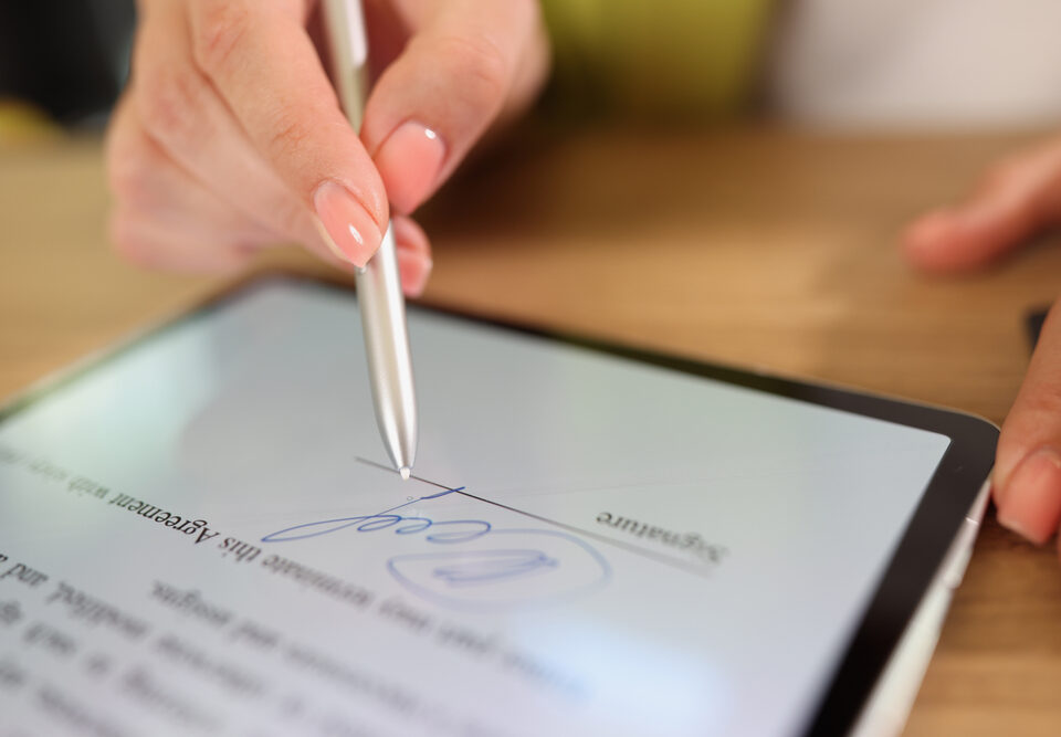 Woman signing eSignature