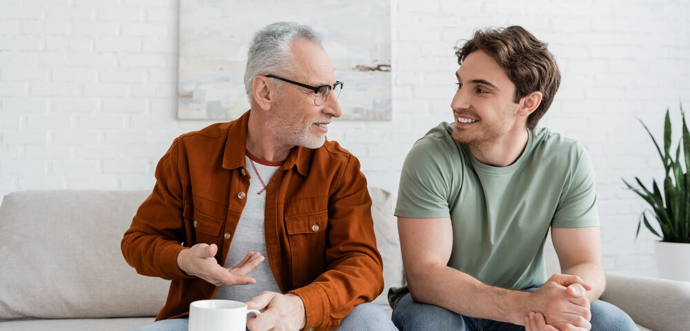 Man talking to son about estate plan.