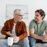 Man talking to son about estate plan.